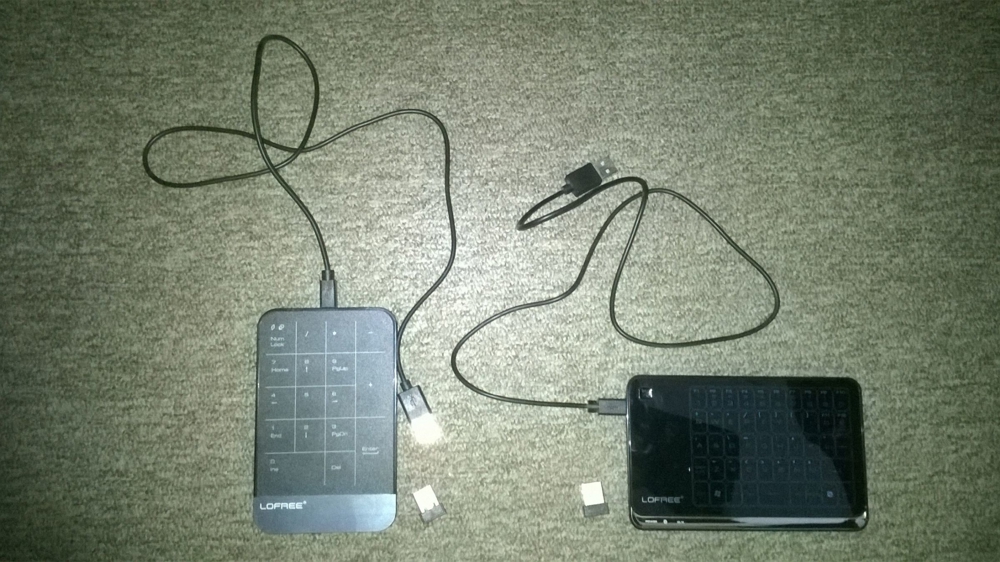 TouchPads Lofree MT-100 und MT-200; wireless/kabellos; WIndows 8 compatible; int. Akku; USB-Ladekab.