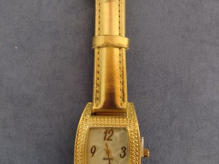 hübsche Quarz Damen Armband Uhr, Golddesign - kein Gold- second hand