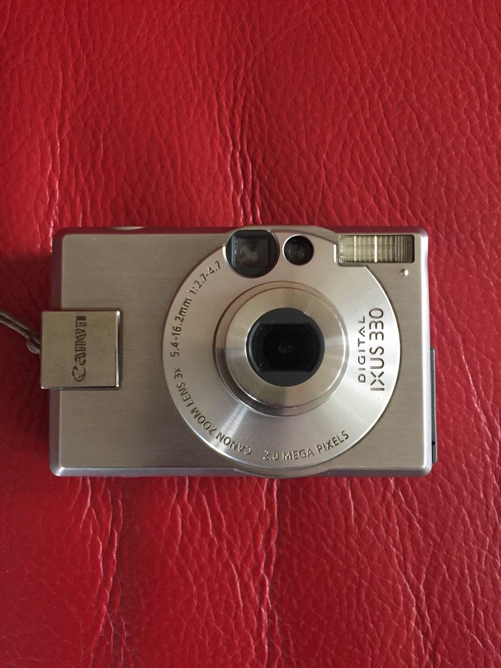 Canon Ixus 330 Digitalcamera mit Beschreibung und Ladegerät