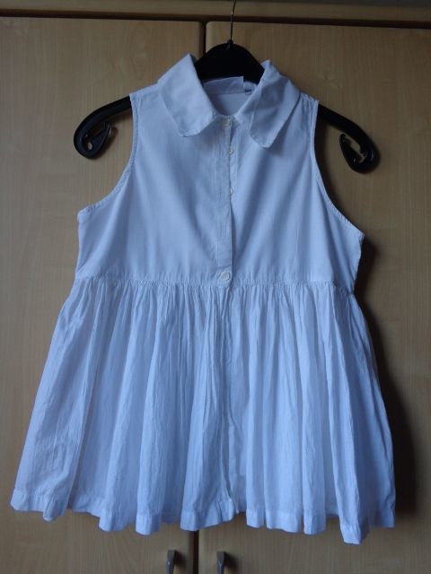Mädchenbekleidung Bluse, ohne Ärmel, unterer Teil gekrinkelt, weiß, Gr. 152, UPLINE