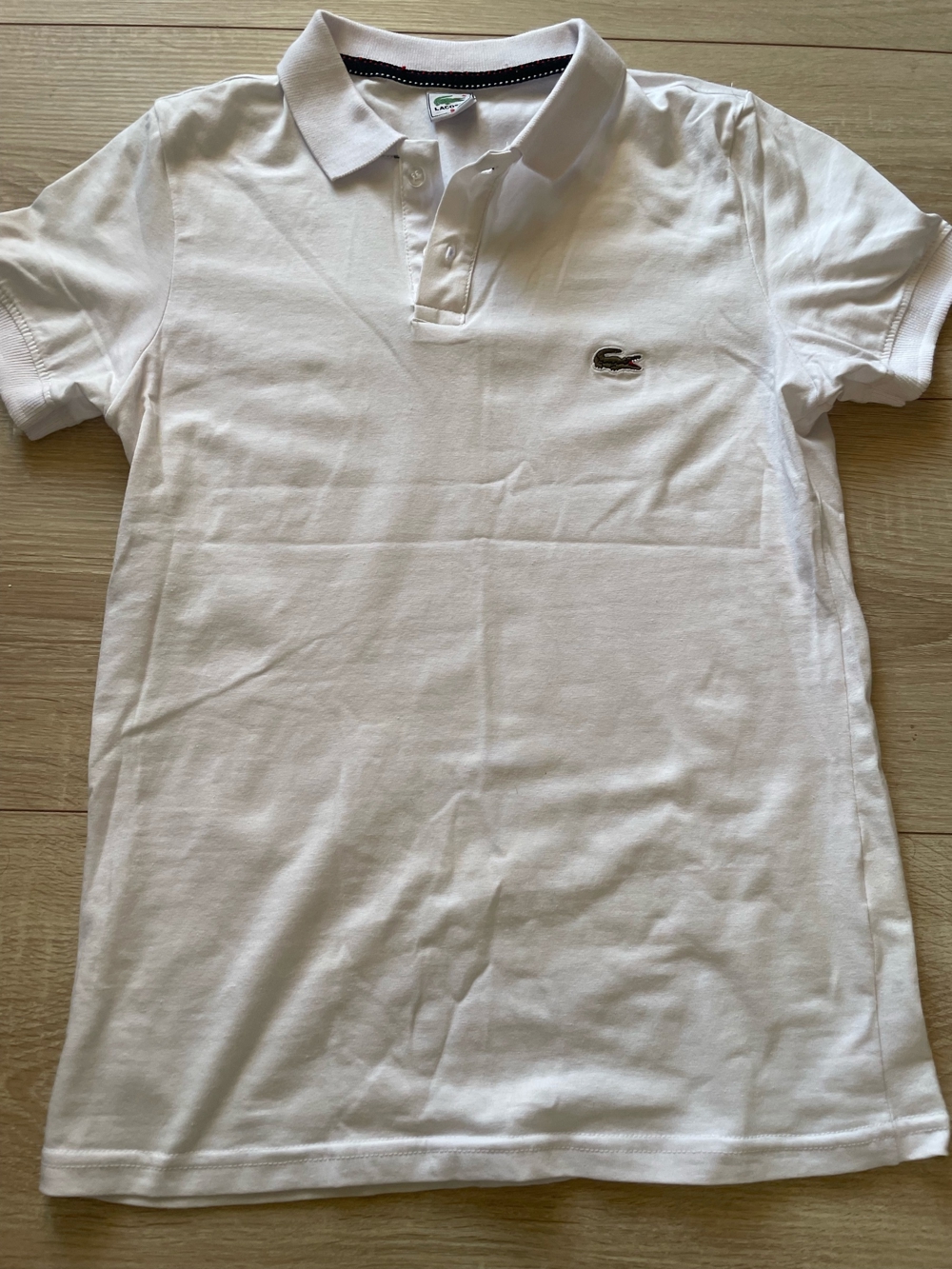 Poloshirt Lacoste in S (slim fit)