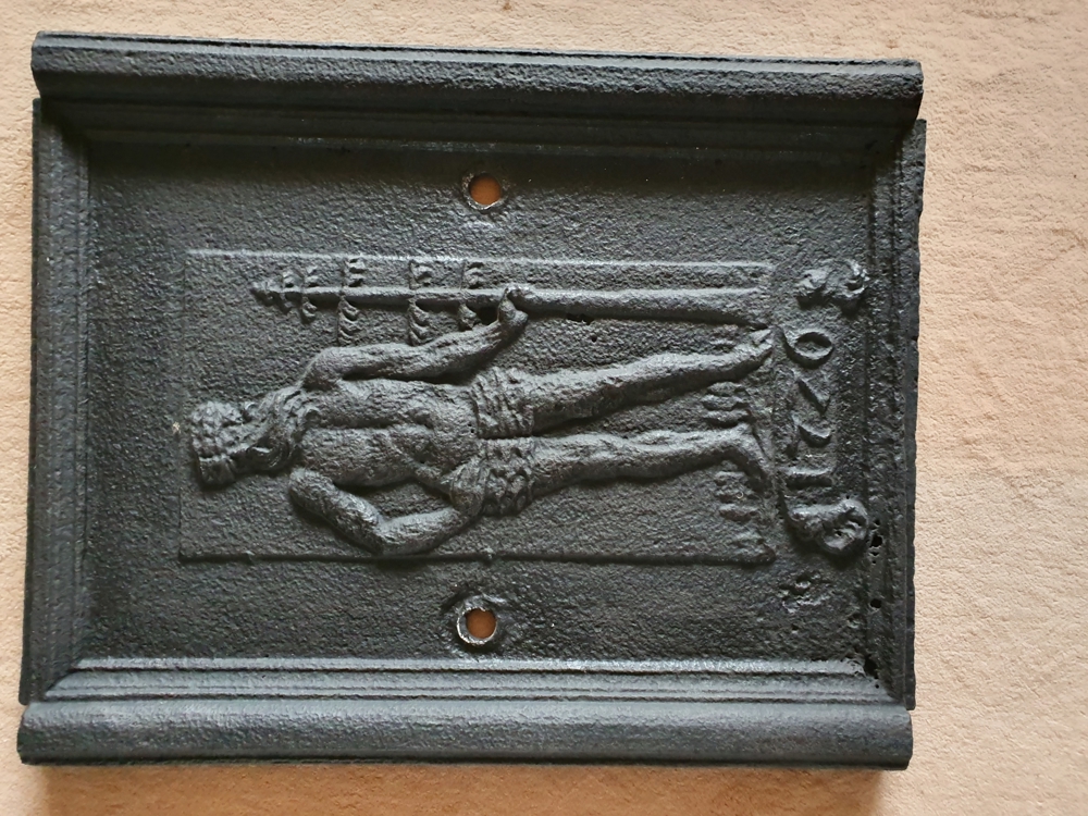 Alte Kaminplatte "Wilder Mann"