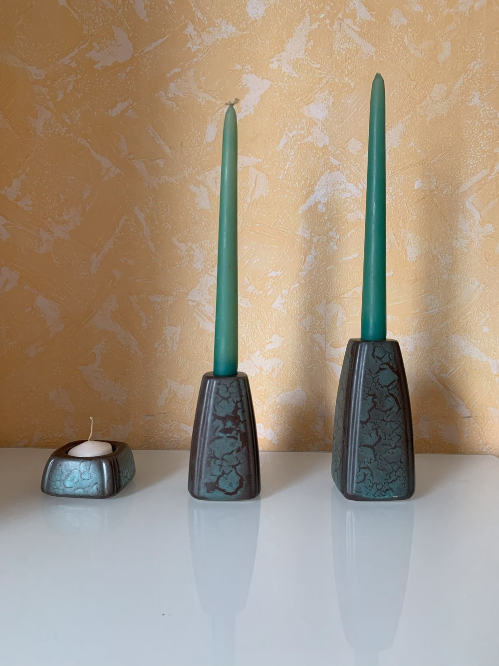 3 dekorative Kerzenhalter aus Keramik