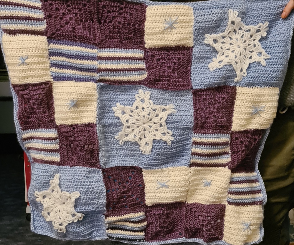 Patchwork Decke mit Schneeflocken 