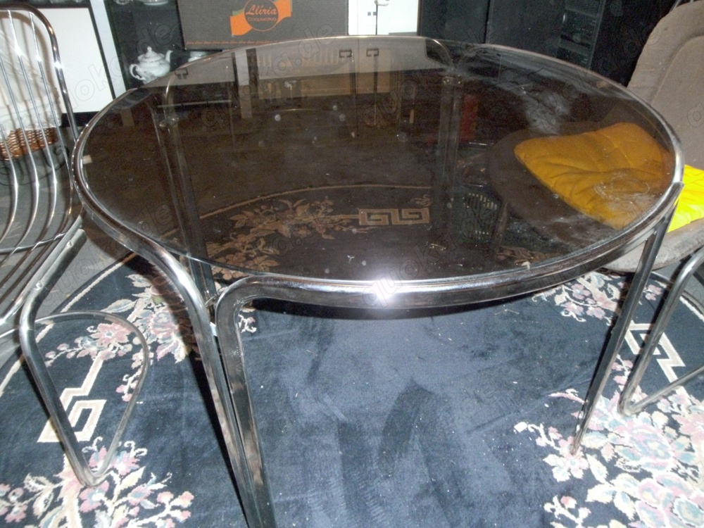 Glastisch rund mit 4 Schwingstühlen