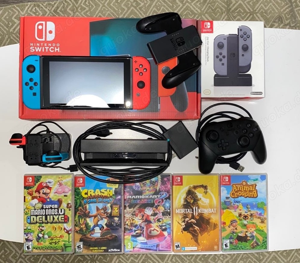 Nintendo Switch 4 joycon + 5 Spiele