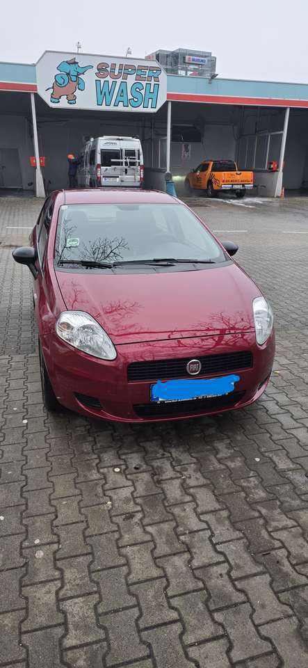 Fiat Grande Punto Punto 1.2 8V mit Sommer- Winterreifen auf Felgen