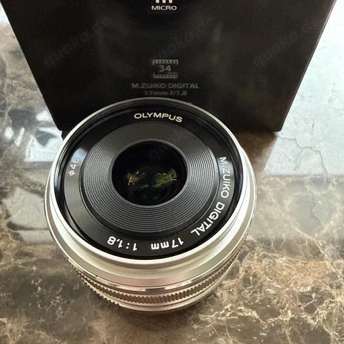 Olympus M.Zuiko Digital EW-M1718 17 mm F 1.8 MFT Objektiv (Silber) - WIE NEU Olympus M.Zuiko Digital EW-M1718 17 mm F 1.8 MFT Objektiv (Silber) - WIE NEU