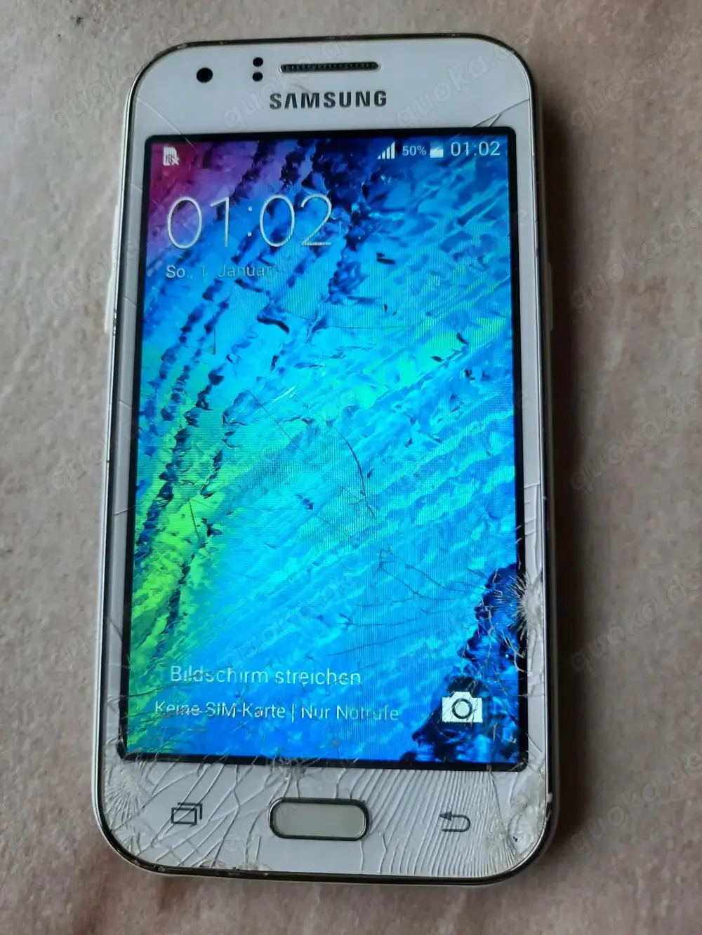 Samsung Galaxy J1 weiß technisch sehr guter Zustand Glasschaden