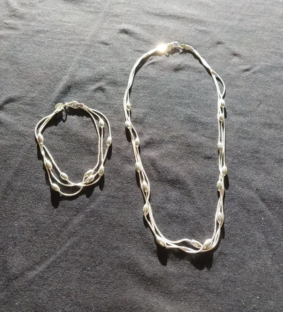 Zweiteiliges Schmuckset: Silberkette + Silberarmband