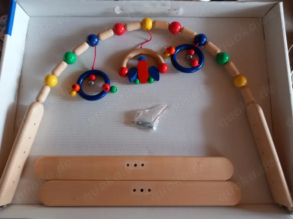 Pontino von Selecta. Super schöner Holz Spielbogen für Babys