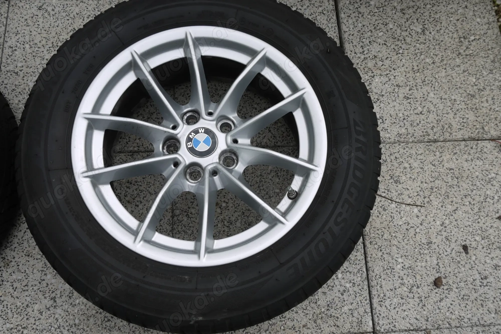 Winterreifen Bridgestone Blizzak LM 001. 205 60R16.  BMW-Felgen 6 1 2Jx16