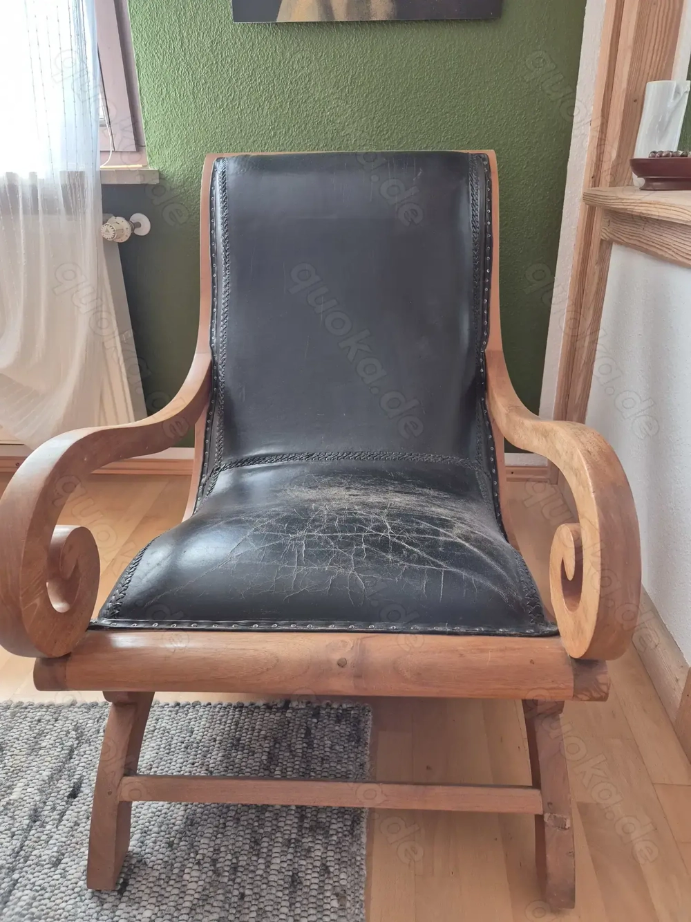Sessel aus Teakholz mit Ledersitzfläche Sessel aus Teakholz mit Ledersitzfläche