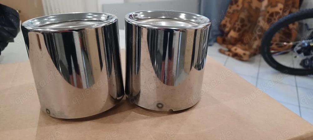 Verkaufe 2 neuwertige Original BMW Endrohrblenden in silber für BMW F 40 128 ti oder 120 i