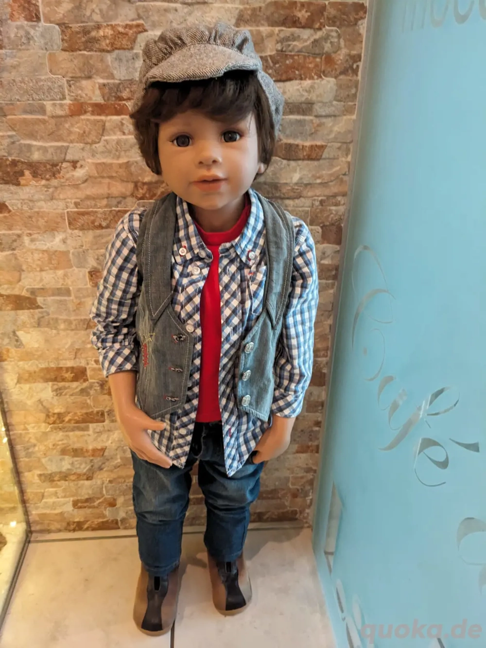 Puppe mit Zertifikat