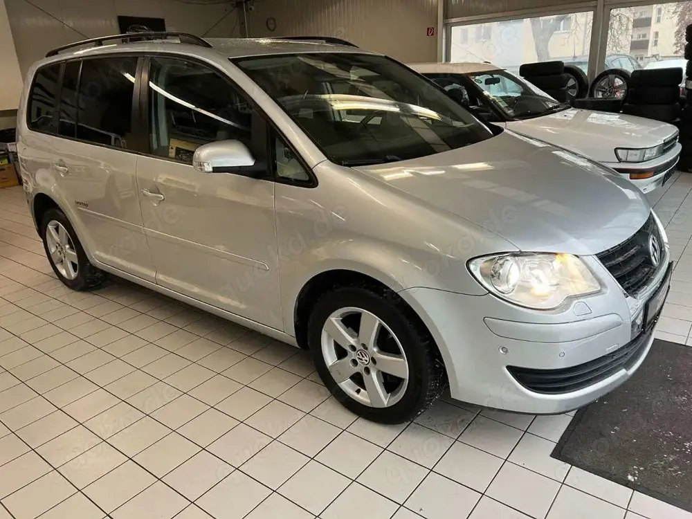 Volkswagen Touran United*TÜVneu*Sitz-H*Navi*AHK*Bi-Xenon*