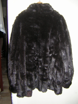 Schicker Pelzmantel aus Polyester in schwarz, gepflegt Bild 4