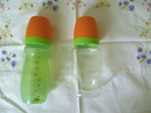 Babyflasche Trinkflasche von Tupperware Babylöffel Kinderteller Trinklerntasse  Bild 1