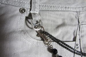 Minirock grau mit Kette schwarze Perlen dran Gr. 36 S -neu- Bild 7