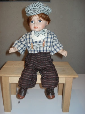 Sammler-Puppe Junge sitzend Deko ca. 38cm Bild 1