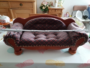 Puppencouch. 3 Puppen.