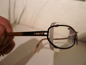 JOOP-Brillengestell randlos (und doch mit Rand), unisex, schwarz-braun-gold, original Bild 13