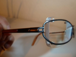 JOOP-Brillengestell randlos (und doch mit Rand), unisex, schwarz-braun-gold, original Bild 20