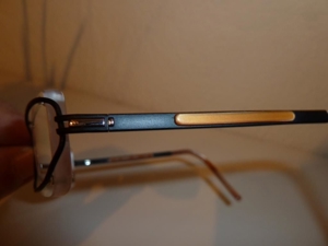 JOOP-Brillengestell randlos (und doch mit Rand), unisex, schwarz-braun-gold, original Bild 8