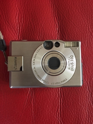 Canon Ixus 330 Digitalcamera mit Beschreibung und Ladegerät Bild 2