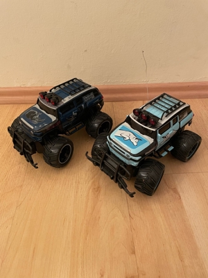 RC Trucks 4x Ford F 150 schwarz und rot Wilde Kerle