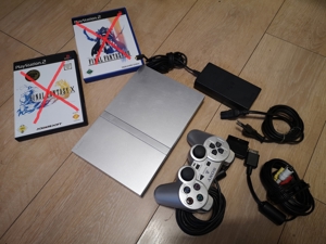 Playstation 2 PS2 Slim Silver Edition mit Final Fantasy X und XII Bild 1