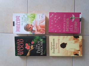 vier verschiedene Bücher 