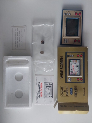 Nintendo Game & Watch EGG Spiel. EG-26 1981 mit Box, Anleitung, FUNKTION, NEUWERTIG Bild 1