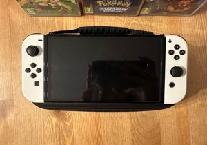 Nintendo Switch OLED + Spiele und Zubehör Bild 2