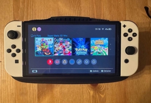 Nintendo Switch OLED + Spiele und Zubehör Bild 4
