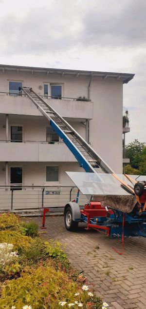 Umzug Dachdeckeraufzug Schrägaufzug Bauaufzug Kran mieten Bild 4