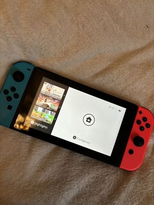 Nintendo Switch Oled mit spielen  Bild 3