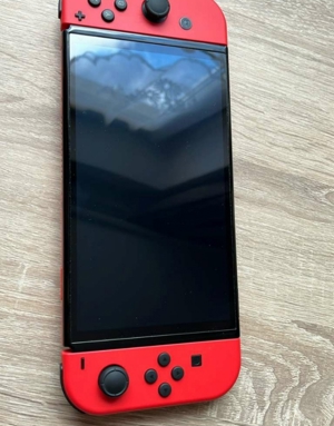 Nintendo Switch OLED (3 Monate alt) Bild 7