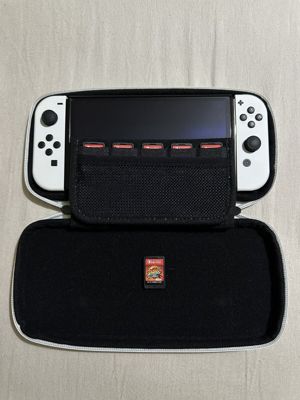 Nintendo switch oled mit Spielen  Bild 1