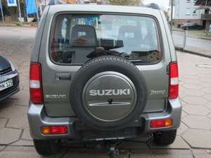 Suzuki Jimny 1,3 Style,ABS,Klima,el.Fh,el.Sp,AHK,Alu,ZV,CD,NSW Bild 5