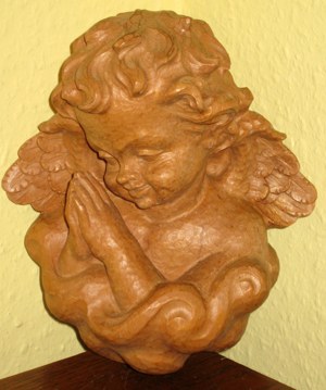 geschnitzte Wandfigur