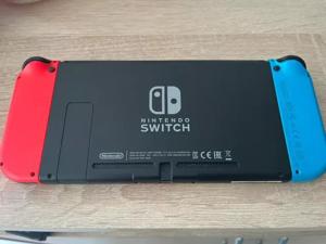 Nintendo Switch Konsole mit 4 x Joy-Con und 4 Spielen wie NEU Bild 2