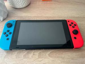 Nintendo Switch Konsole mit 4 x Joy-Con und 4 Spielen wie NEU Bild 3