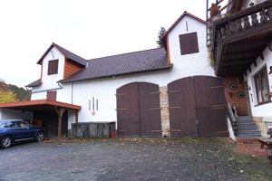 Mehrfamilienhaus mit ländlichen Anwesen Bild 2