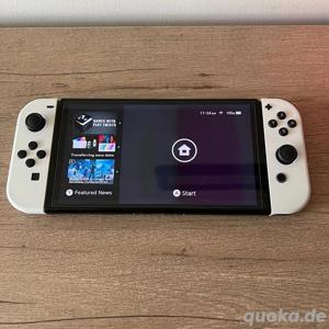 Nintendo Switch  OLED + 2 Spiele Bild 1