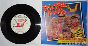 R Single Spitting image The chicken song I ve never Met A nice South African 1986 Vinyl Schallplatte