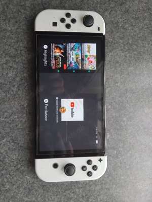 Nintendo switch oled mit 3 spiele+ lenkrad