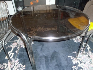 Glastisch rund mit 4 Schwingstühlen Bild 1