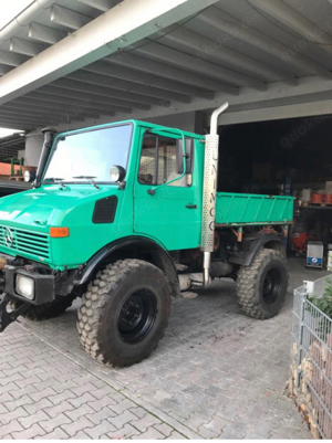 Unimog 424 mit Seilwinde und Anhänger