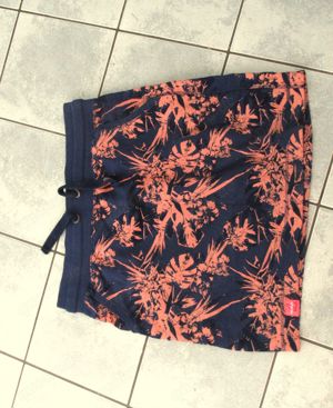 Neuwertiger blauer Rock orangefarbigen Muster Maui sports Gr. L Skater Rock